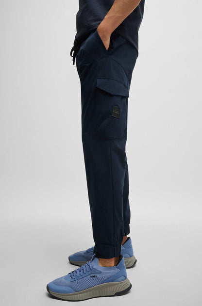 Hugo Boss Tapered-fit Trousers In Easy-iron Stretch Poplin - Dark Blue